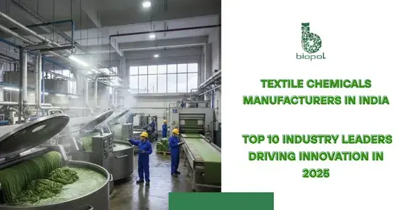 Industrial textile dyeing process with green fabrics in large machines, workers monitoring production in factory setting. -Textile Chemicals Manufacturers in India. -1