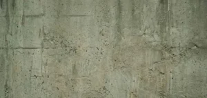 Minimalist textured background with muted green-gray tones, subtle grain, soft lighting, abstract industrial surface aesthetic. -Silicone Thermal Stability. -1