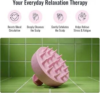 silicone scalp massager with soft, flexible bristles resting on a clean marble bathroom counter