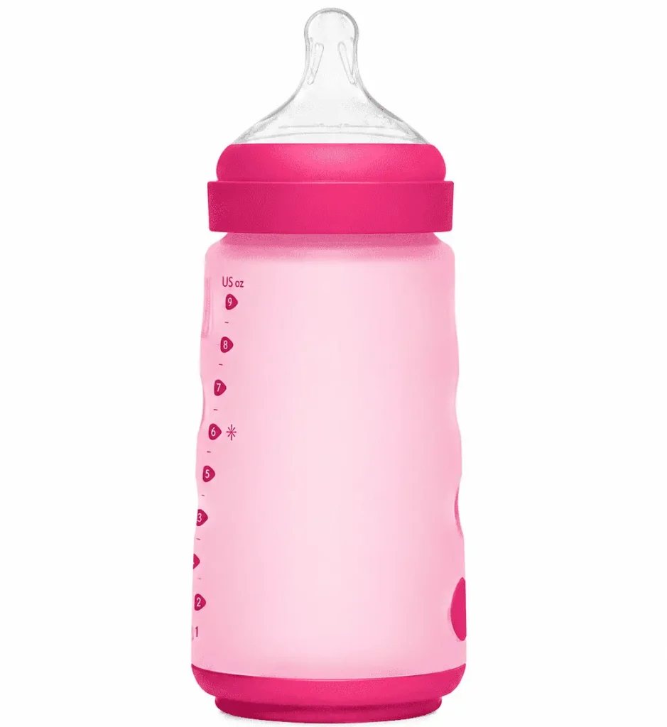 Silicone baby bottles in baby pink and dark pink with a clear nipple on a white background