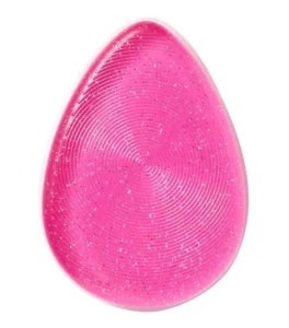 Pink silicone makeup blender with a textured, concentric-ring surface on a white background. - Silicone Makeup Blender 1