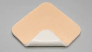 Silicone foam dressing showing a soft foam center and adhesive layer - silicone foam dressing - 1