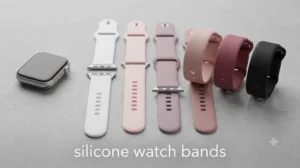 a silver smartwatch is placed next to an array of pastel and neutral-toned silicone bands.