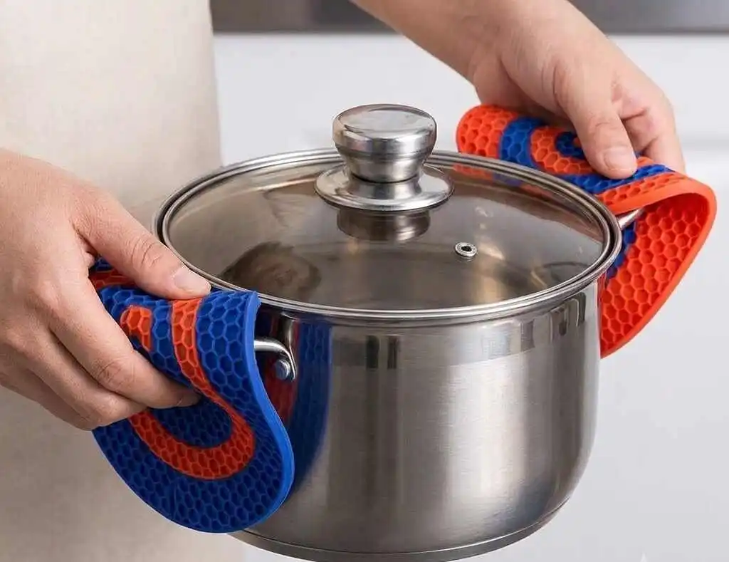 Hands holding hot pot with textured silicone hot pads - silicone hot pads- 2